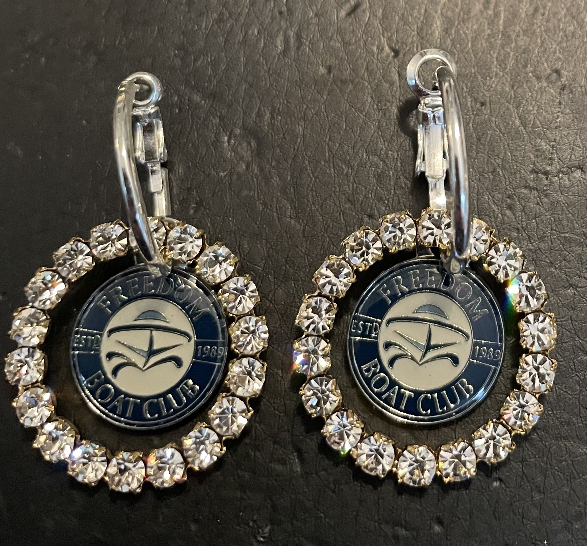 Freedom Boat Company Earring Set $79. (Priced per pair)