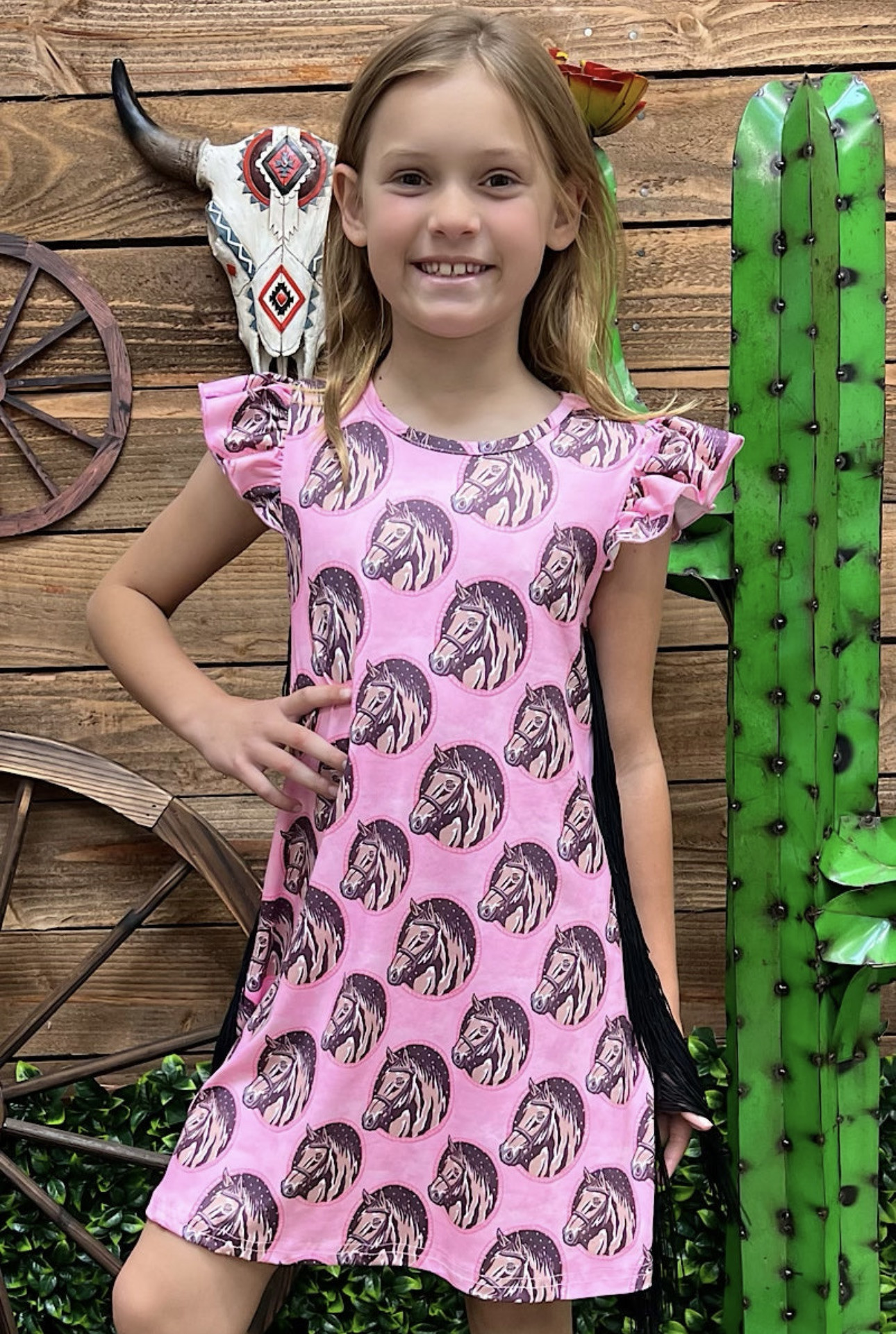 Horse print on pink dress with side tassels
