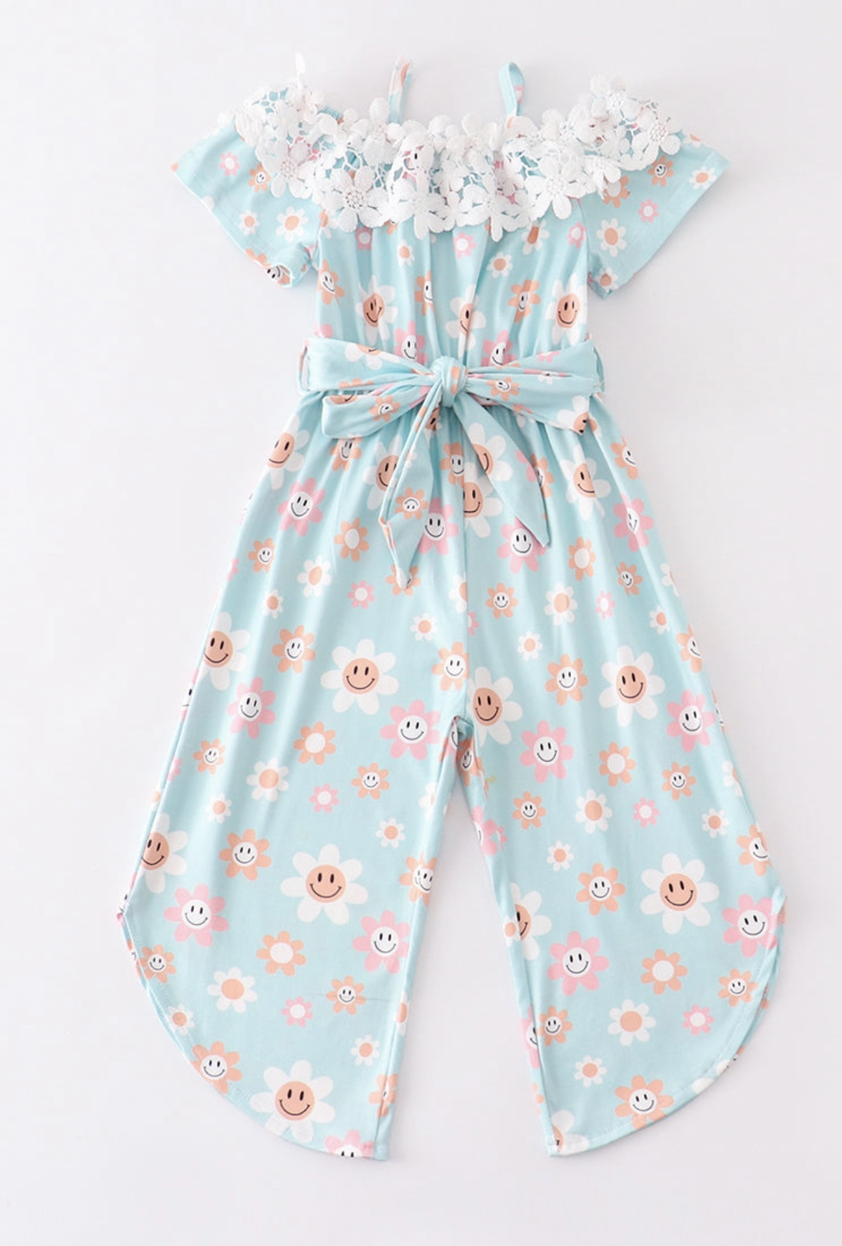 light turquoise capri romper with face flowers
