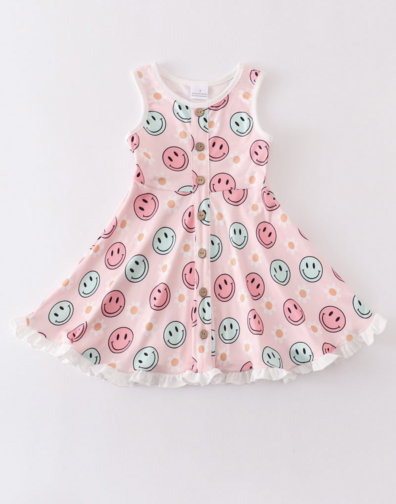 Light pink sundress with flowers and faces